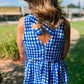 Sleeveless Gingham Cross Back Peplum V Neck Top